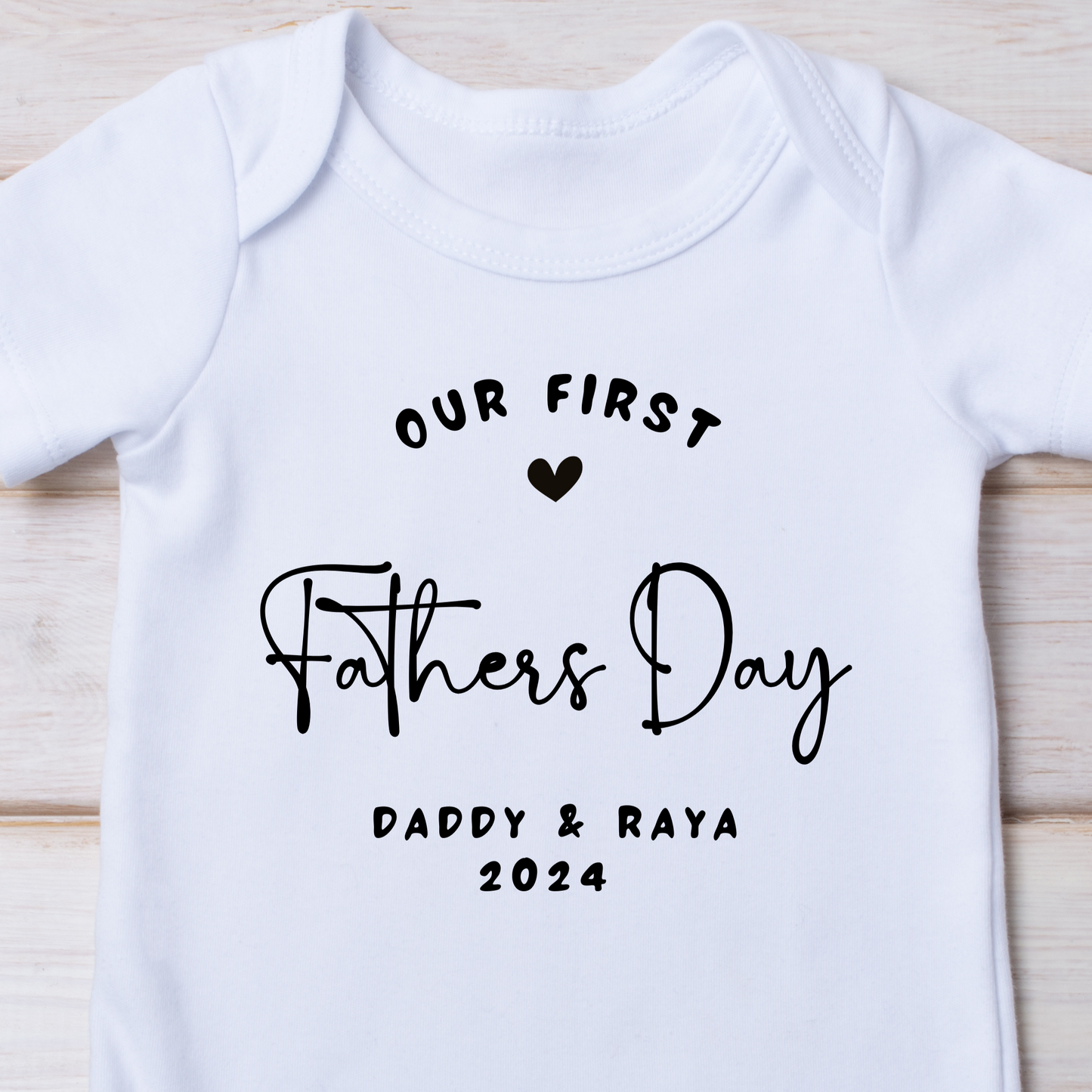 Personalised Black and White Our First Fathers Day Baby Grow