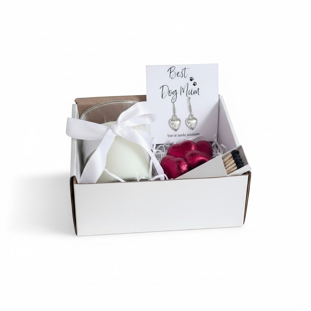 AyeDoGifts Best Dog Mum hamper with silver heart earrings, vanilla candle, chocolates, and matches.