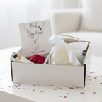 AyeDoGifts Best Dog Mum gift hamper with silver heart necklace, vanilla candle, chocolate hearts, and matches.