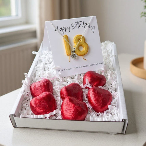 AyeDoGifts 18th birthday gift set with silver cubic zirconia necklace and red heart chocolates.