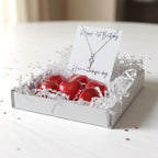 AyeDoGifts 21st birthday gift hamper with sterling silver key charm necklace and red foiled chocolate hearts.
