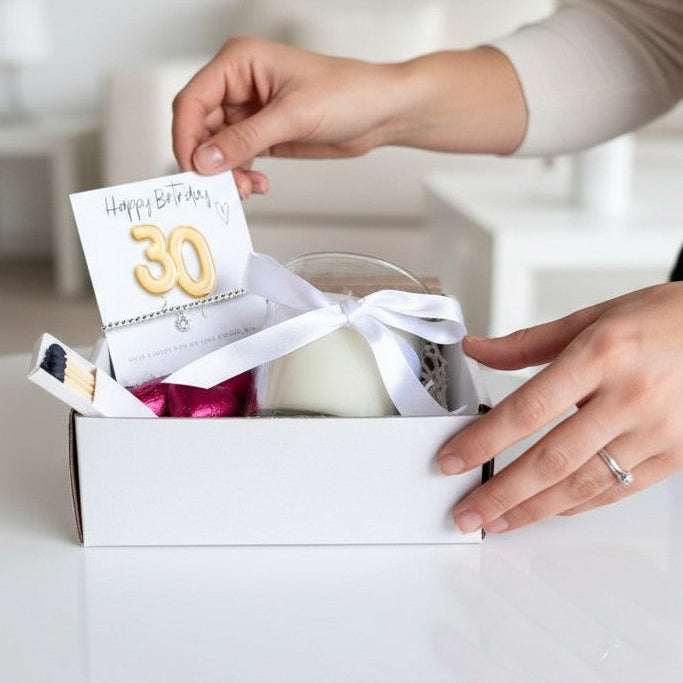 AyeDoGifts 30th birthday gift hamper with gold '30' balloon card, silver bracelet, vanilla candle, chocolate hearts & matches.