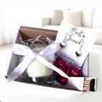 AyeDoGifts Best Friend hamper with silver heart charm earrings, vanilla candle, chocolates, and matches.