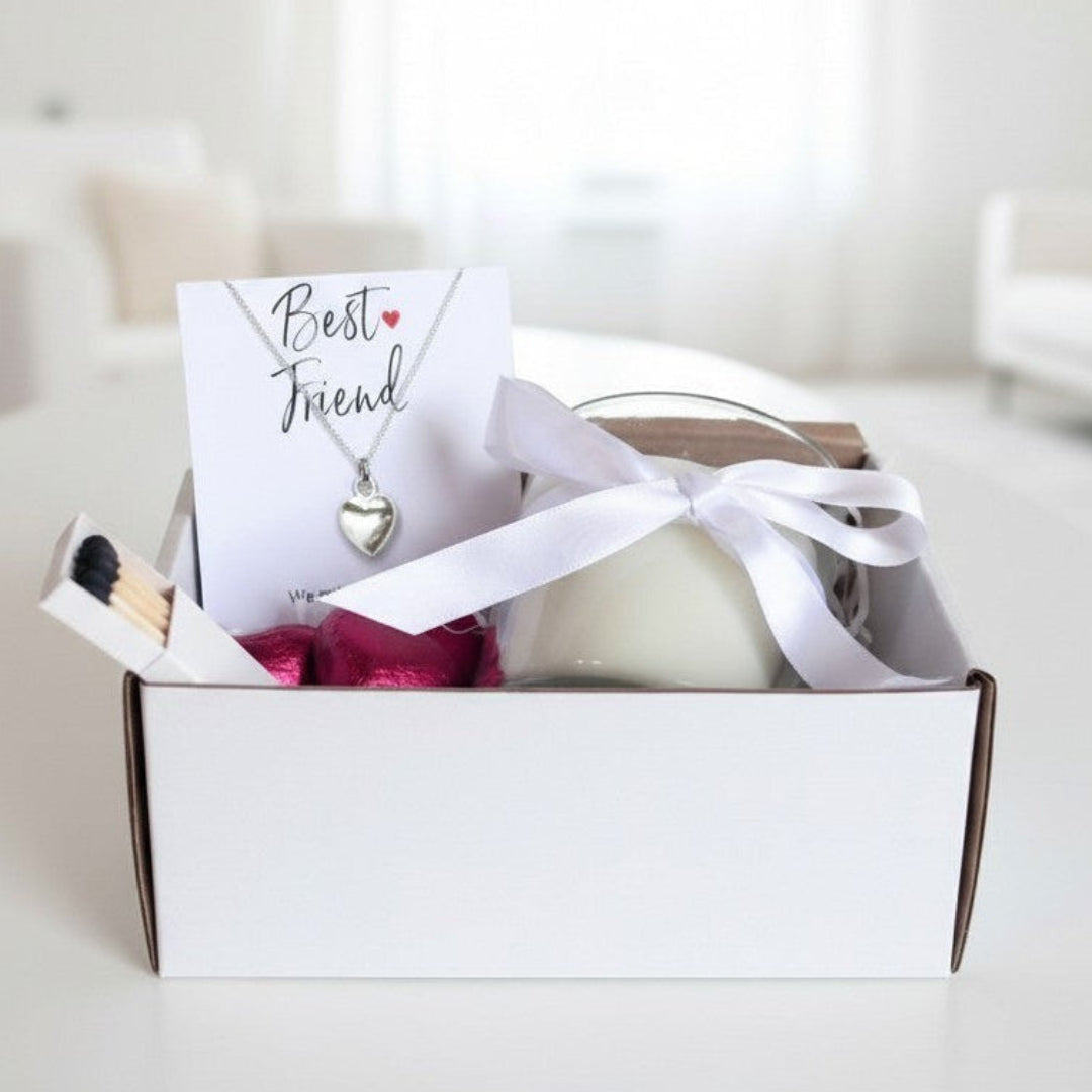 AyeDoGifts Best Friend hamper with silver heart necklace, vanilla candle, matches, and chocolates.