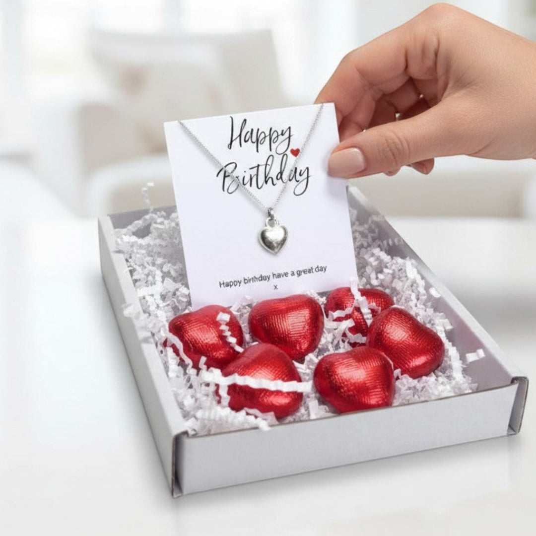 AyeDoGifts Happy Birthday hamper with silver heart necklace and red foiled chocolate hearts.